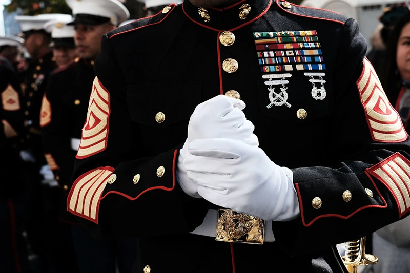 NEW YORK, NY - NOVEMBER 11: U.S. Marines prepare to march in the Veterans Day Parade on November 11, 2017 in New York City. The largest Veterans Day event in the nation, this year's parade features thousands of marchers, including military units, civic and youth groups, businesses and high school bands from across the country and veterans of all eras. The U.S. Air Force is this year's featured service and the grand marshal is space pioneer Buzz Aldrin. (Photo by Spencer Platt/Getty Images)