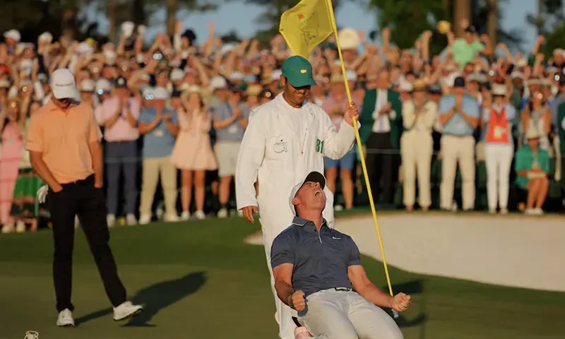 Rory McIlroy celebrates after winning The Masters and completing a career grand slamGolf in Augusta, Georgia, U.S. April 13, 2025 REUTERS/Mike Blake