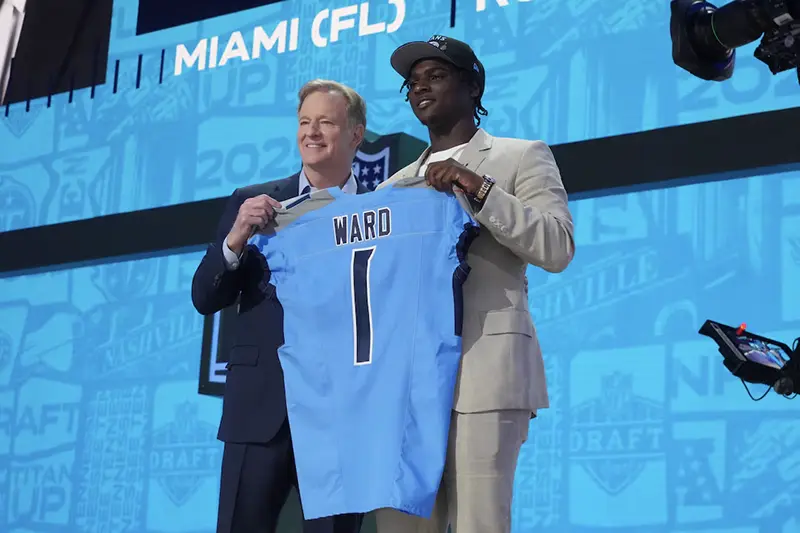 NFL commissioner Roger Goodell stands with Miami Hurricanes quarterback Cameron Ward after he is selected by the Tennessee Titans as the number one pick in the first round of the 2025 NFL Draft at Lambeau Field. Mandatory Credit: Kirby Lee-Imagn Images