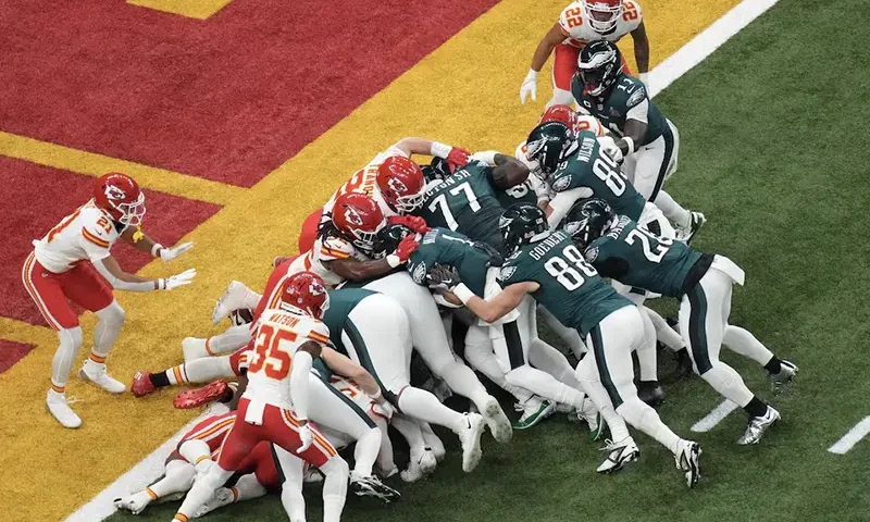 Philadelphia Eagles quarterback Jalen Hurts (1) rushes the ball for a touchdown against the Kansas City Chiefs during the first quarter in Super Bowl LIX at Caesars Superdome. Mandatory Credit: Kirby Lee-Imagn Images/File Photo
