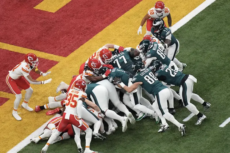 Philadelphia Eagles quarterback Jalen Hurts (1) rushes the ball for a touchdown against the Kansas City Chiefs during the first quarter in Super Bowl LIX at Caesars Superdome. Mandatory Credit: Kirby Lee-Imagn Images/File Photo