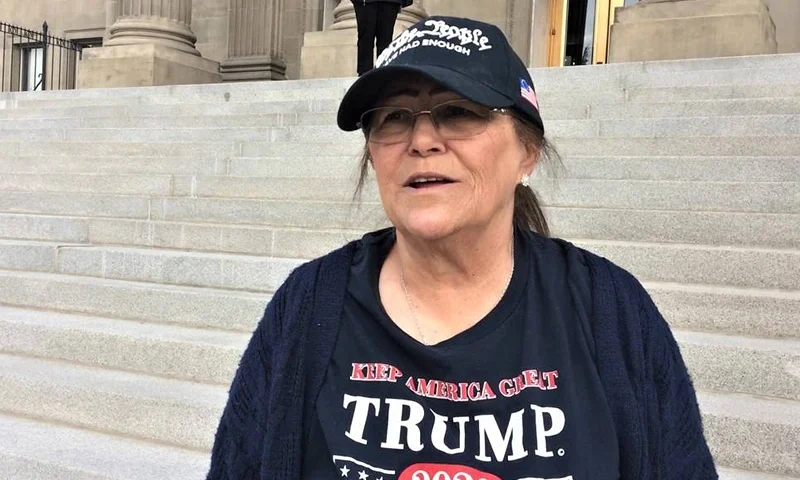 Boise's Pam Hemphill is seen on the steps of the Idaho Capitol in 2020. A former Trump supporter, she has since changed her stance on the Jan. 6, 2021, riot at the U.S. Capitol that she participated in. (David Staats/Idaho Statesman/Tribune News Service via Getty Images)