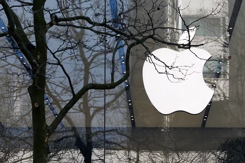 An Apple logo is seen at the entrance of an Apple Store in downtown Brussels, Belgium March 10, 2016. REUTERS/Yves Herman