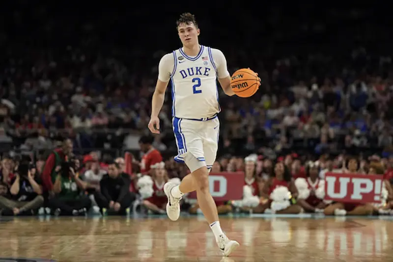 Duke Blue Devils forward Cooper Flagg (2) dribbles the ball against the Houston Cougars during the second half in the semifinals of the men's Final Four of the 2025 NCAA Tournament at the Alamodome. Mandatory Credit: Bob Donnan-Imagn Images/ File Photo