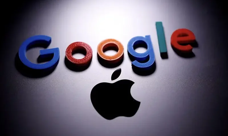 A 3D printed Google logo is placed on the Apple Macbook in this illustration taken April 12, 2020. REUTERS/Dado Ruvic/Illustration/File Photo