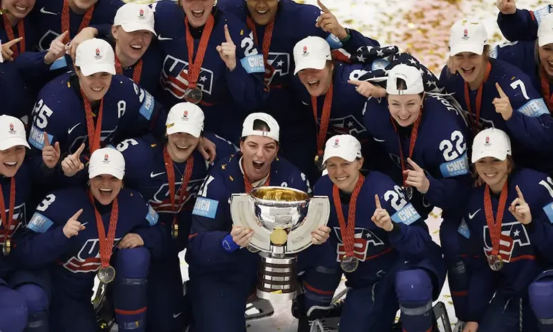 United States players celebrate with the trophy after winning the Gold Medal Game REUTERS/David W Cerny