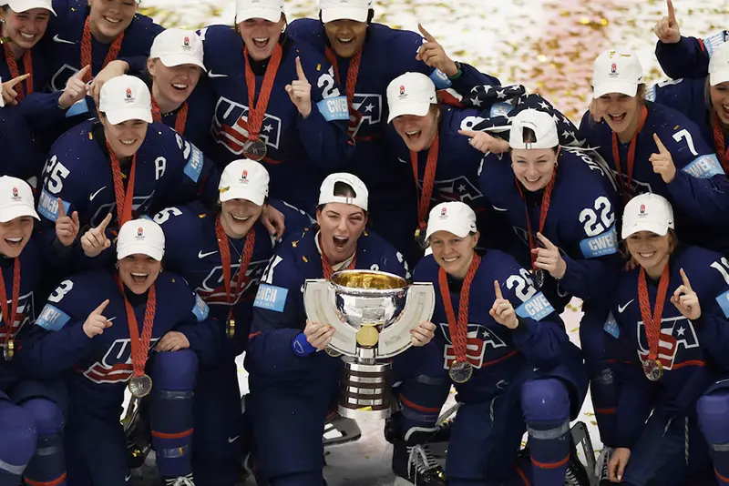 United States players celebrate with the trophy after winning the Gold Medal Game REUTERS/David W Cerny