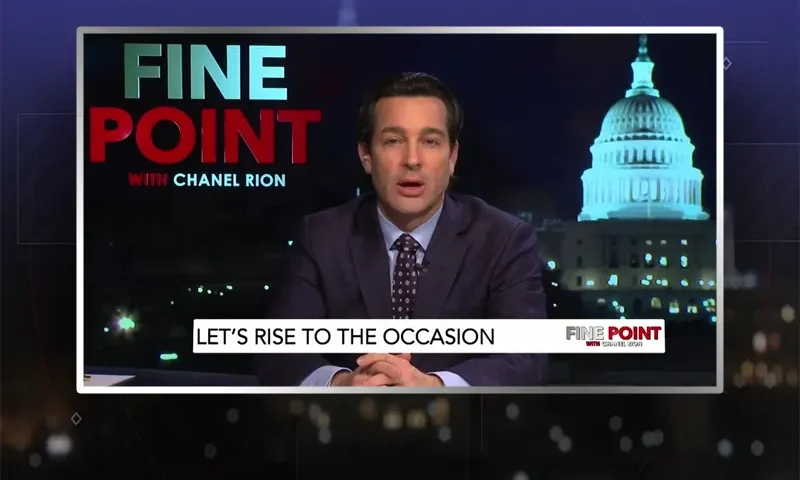 Video still of the host of Fine Point at the desk of their talk show on One America News Network.