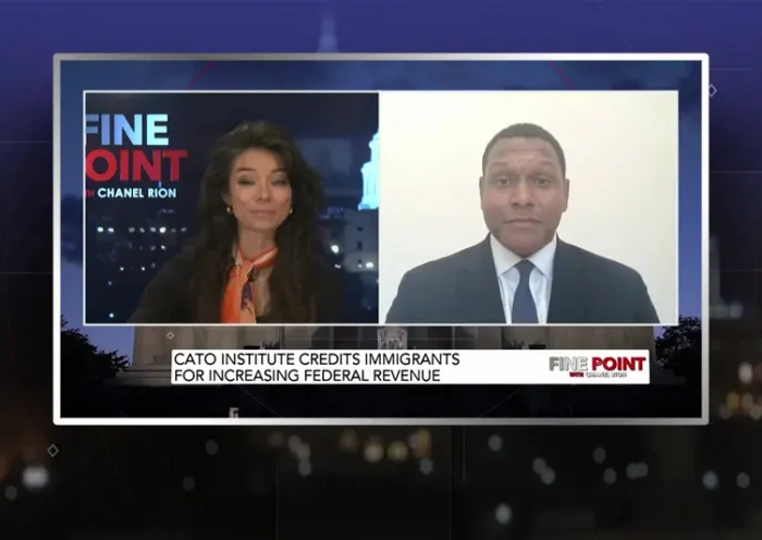 Video still from Fine Point on One America News Network showing a split screen of the host on the left side, and on the right side is the guest, Stephen Rowe.