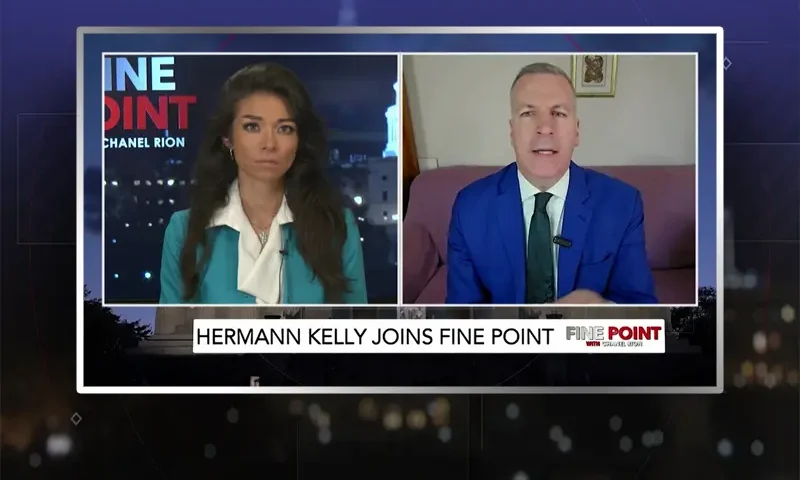 Video still from Fine Point on One America News Network showing a split screen of the host on the left side, and on the right side is the guest, Hermann Kelly.