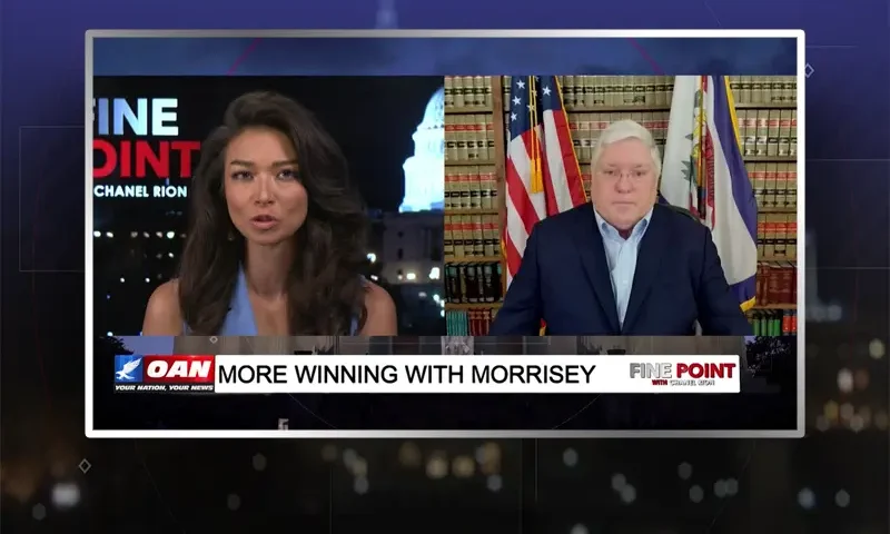 Video still from Fine Point on One America News Network showing a split screen of the host on the left side, and on the right side is the guest, Patrick Morrisey .