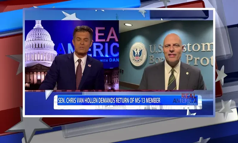 Video still from Real America on One America News Network showing a split screen of the host on the left side, and on the right side is the guest, Ron Vitiello.