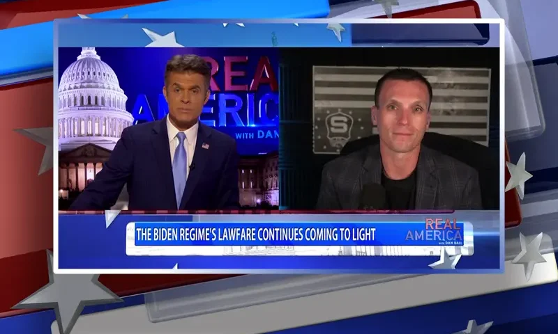 Video still from Real America on One America News Network showing a split screen of the host on the left side, and on the right side is the guest, Steve Friend.