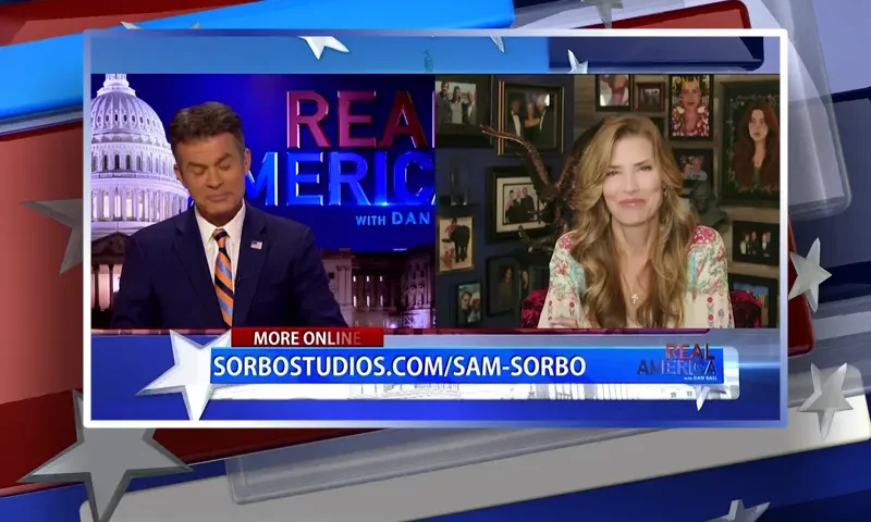 Video still from Real America on One America News Network showing a split screen of the host on the left side, and on the right side is the guest, Sam Sorbo.