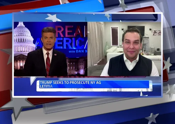 Video still from Real America on One America News Network showing a split screen of the host on the left side, and on the right side is the guest, George Santos.