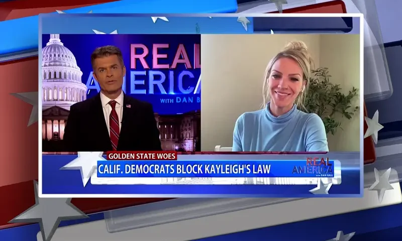 Video still from Real America on One America News Network showing a split screen of the host on the left side, and on the right side is the guest, Kayleigh Kozak.