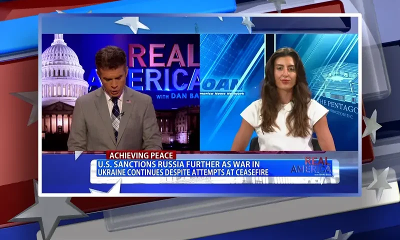Video still from Real America on One America News Network showing a split screen of the host on the left side, and on the right side is the guest, Gabrielle Cuccia.