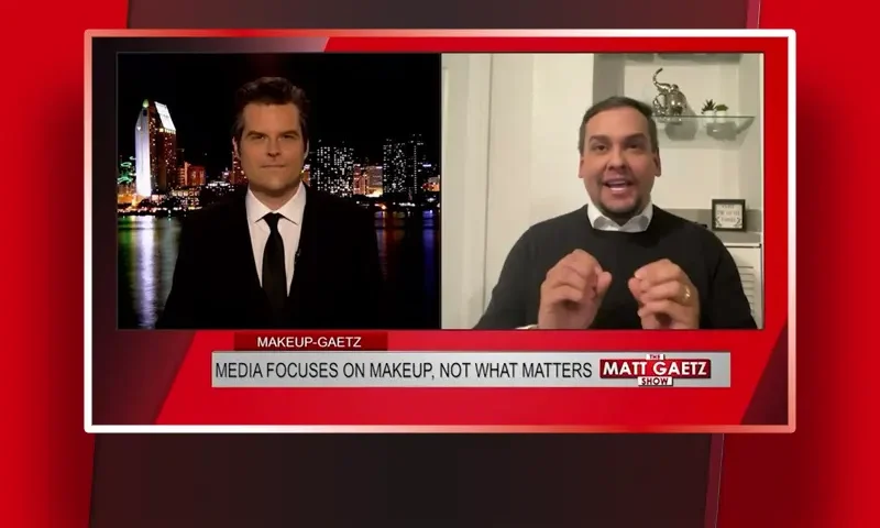Video still from The Matt Gaetz Show on One America News Network showing a split screen of the host on the left side, and on the right side is the guest, George Santos.