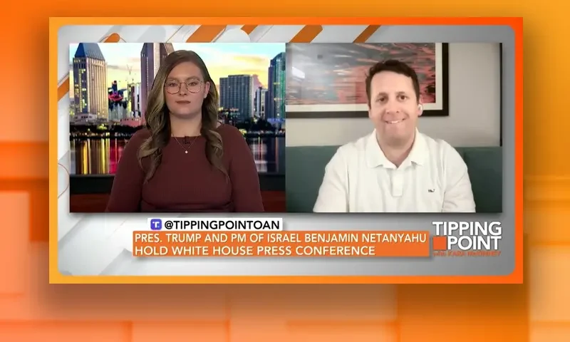 Video still from Tipping Point on One America News Network showing a split screen of the host on the left side, and on the right side is the guest, Benjamin Weingarten.