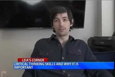 Screenshot of a studio interview with Warren Smith Of Secret Scholars.