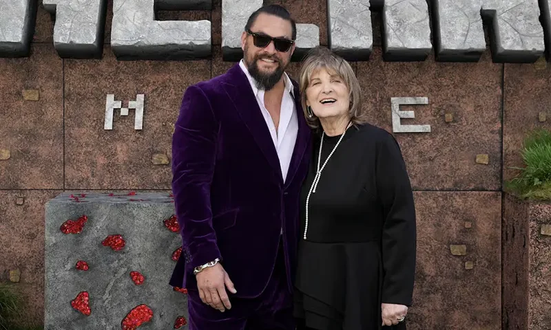 Cast member Jason Momoa attends the world premiere of ''A Minecraft Movie'' with his mother, in London, Britain, March 30, 2025. REUTERS/Maja Smiejkowska